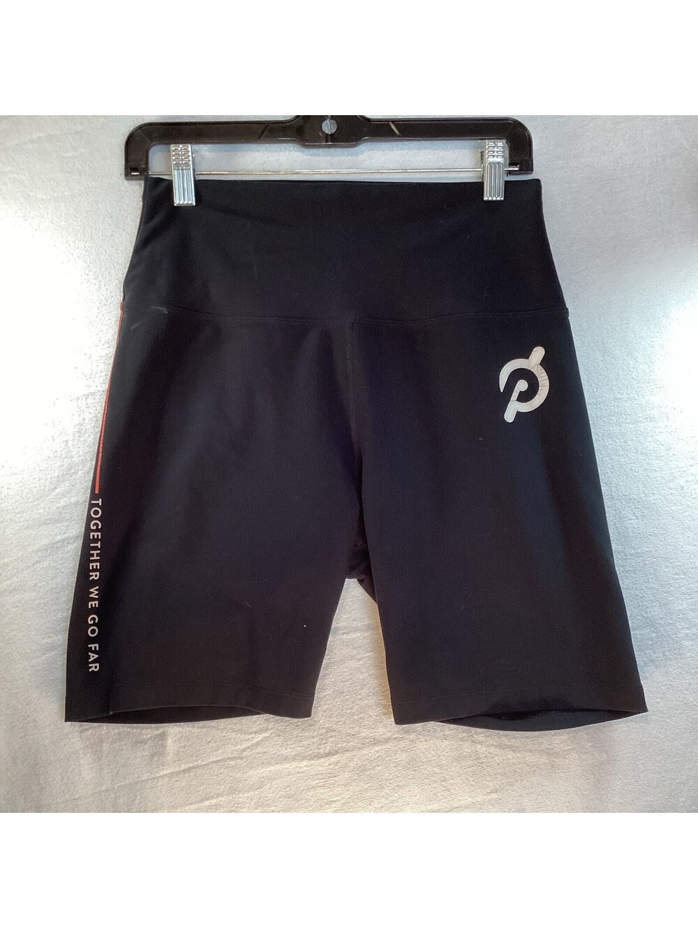 Peleton Cadent 7" high rise pocket bike shorts size L Black with orange stripe